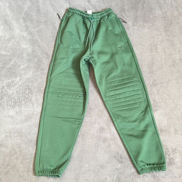 nike therma pants green